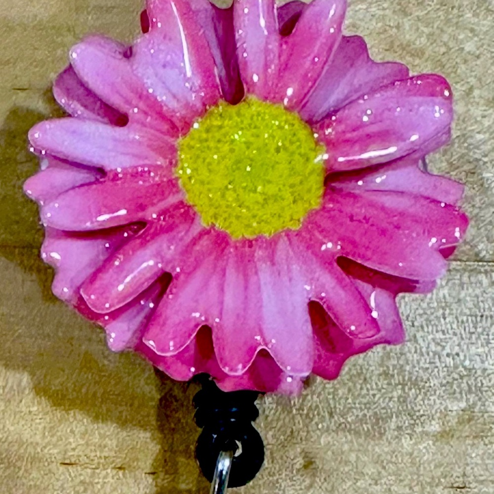 Pink daisy flower 1.5 inch badge reel with belt clip